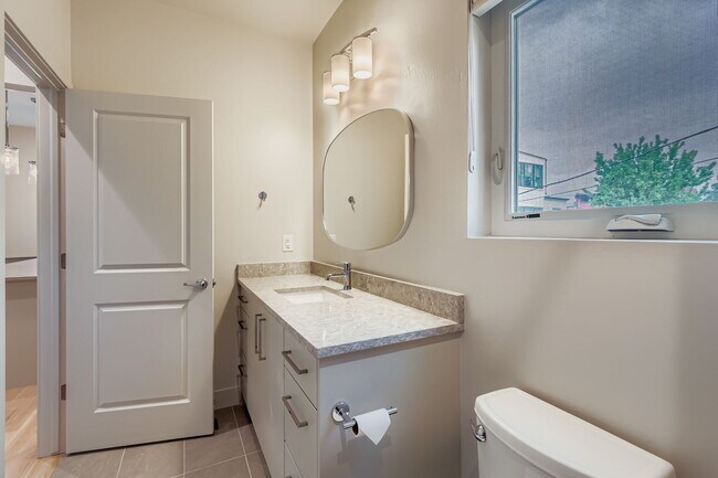 Building Photo - Swanky 1BR – New, Private Garage, Storage,...