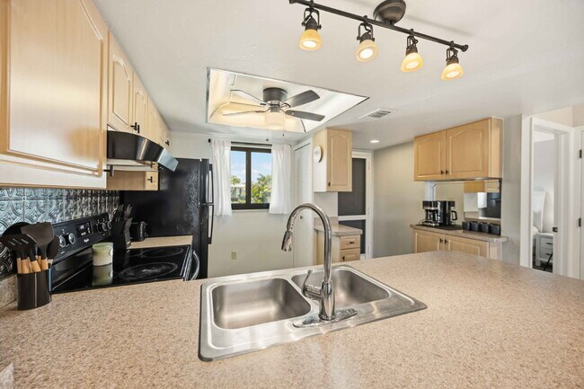 Building Photo - "Charming 2-Bed, 2-Bath Villa in Lake Shore Condominiums"