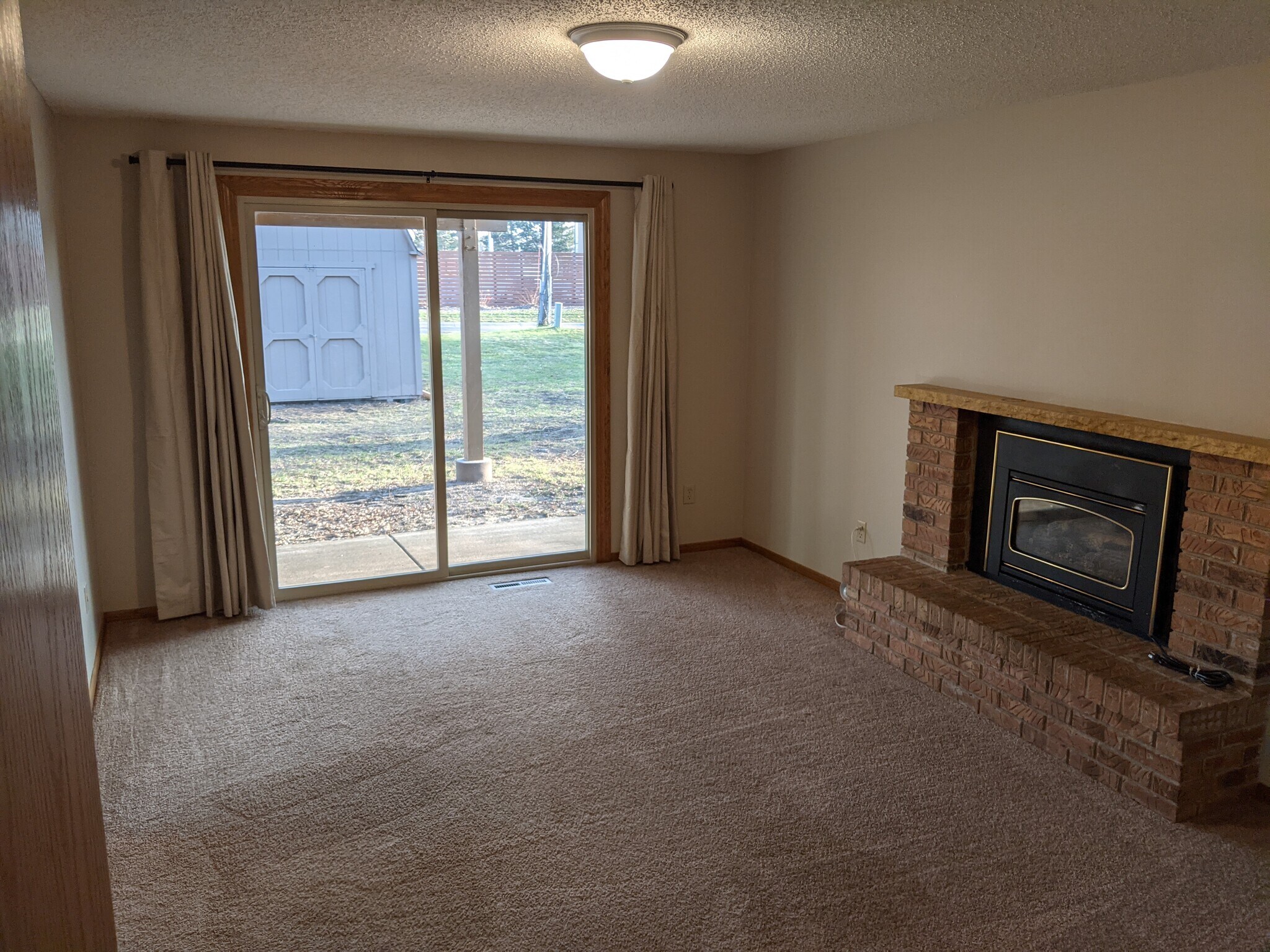 Lower level family room - 7644 Woodlawn Dr