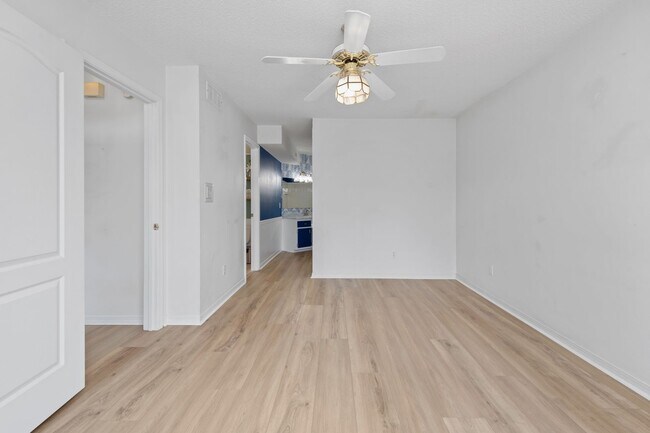 Building Photo - Spacious 3BR Retreat with Soaring Ceilings & Screened Porch