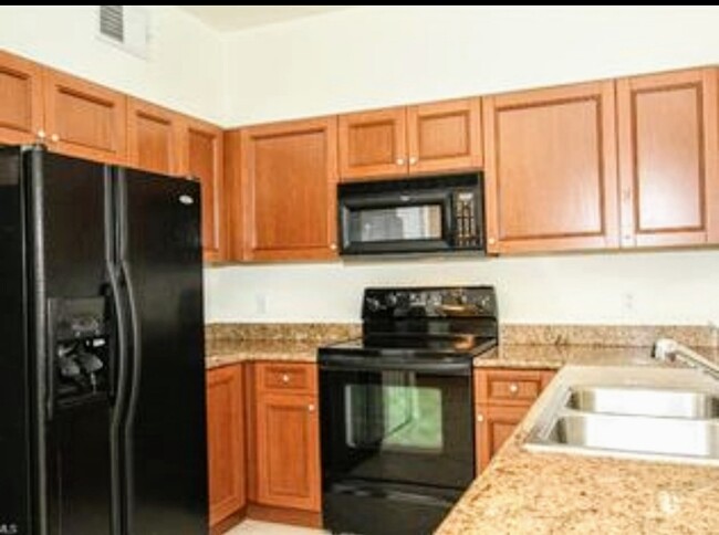 Building Photo - 20230 Estero Gardens Cir