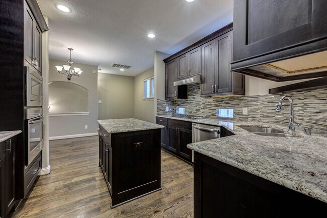 Building Photo - Welcome to this stunning 3-bedroom, 3.5-ba...