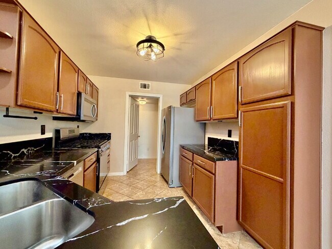 Building Photo - UPGRADED 2 BEDROOM TOWNHOME | SOLAR + PRIVATE YARD | SILVERADO RANCH / HENDERSON