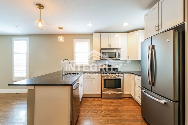 Building Photo - 3622 W 29th Ave