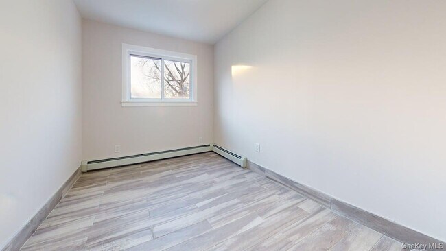 Building Photo - 24-40-40 86th St