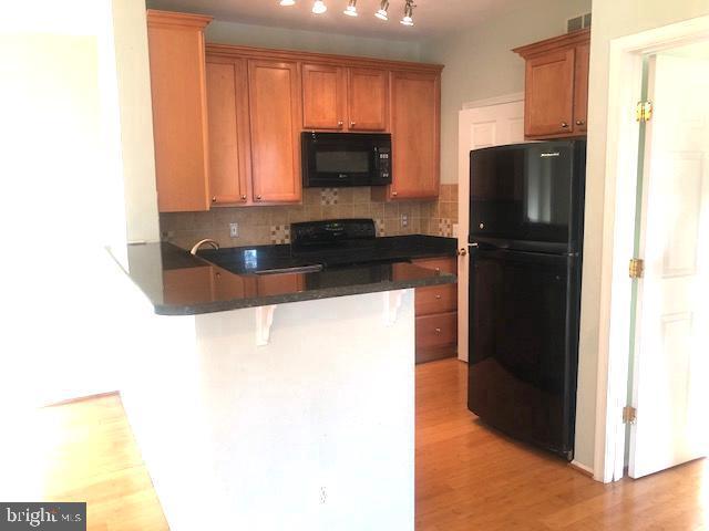 Building Photo - 1601 Spring Gate Dr.