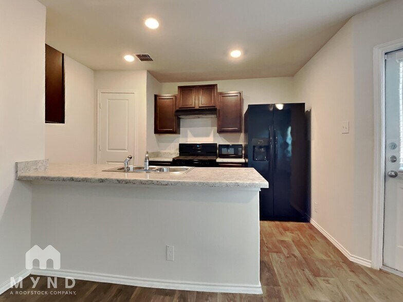Building Photo - 5722 Tranquil Cove