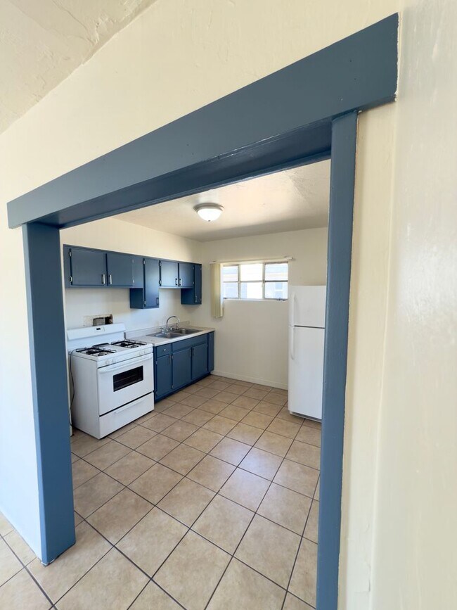 Building Photo - Two Bedroom w/ A/C, Yard and Carport