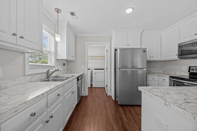 Building Photo - Three-bedroom, two-bathroom home located i...