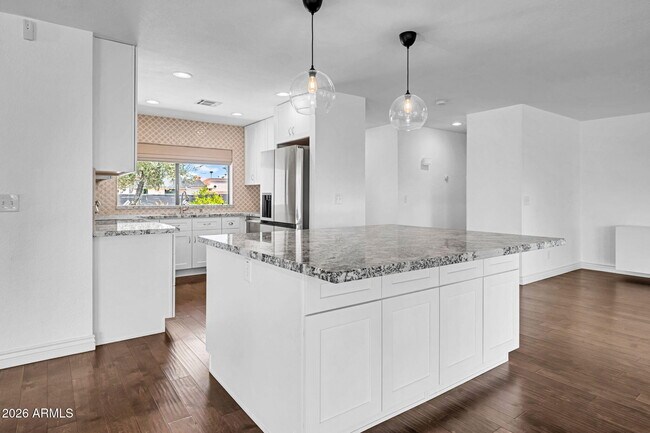 Building Photo - 5219 E Winchcomb Dr