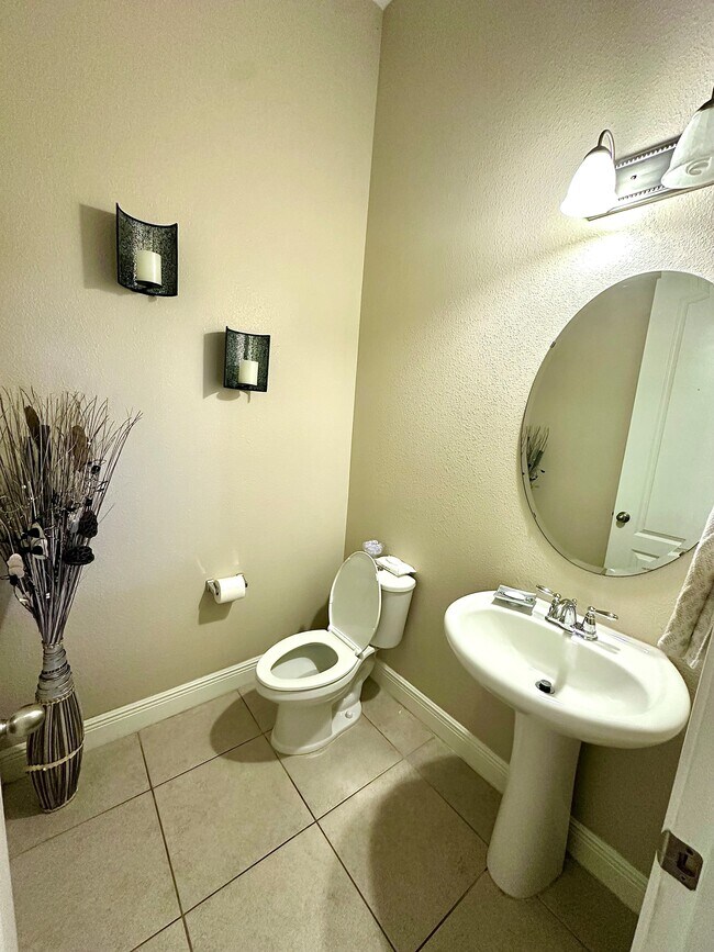 1/2 bath near living room - 1220 Lobelia Dr
