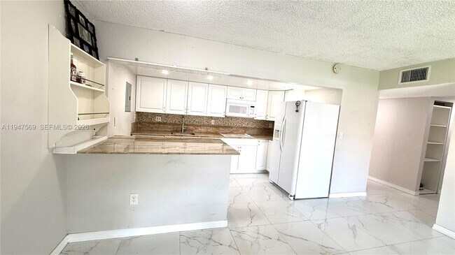 Building Photo - 17600 NW 68th Ave