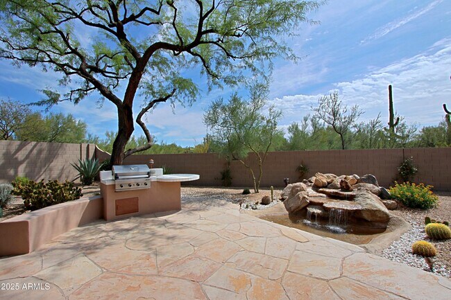 Building Photo - 6879 E Amber Sun Dr