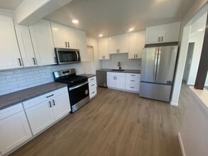 Building Photo - Completely Remodeled 2 Bed, 1 Bath with Garage and Large Yard!