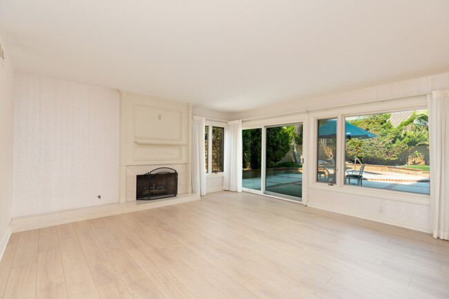 Family room with fireplace - 3481 Aquarius Dr