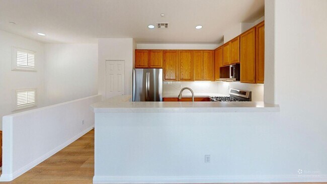 Building Photo - Modern 2BR/2BA Rancho Cucamonga Condo with 2 Balconies & 2-Car Garage – No Carpet!