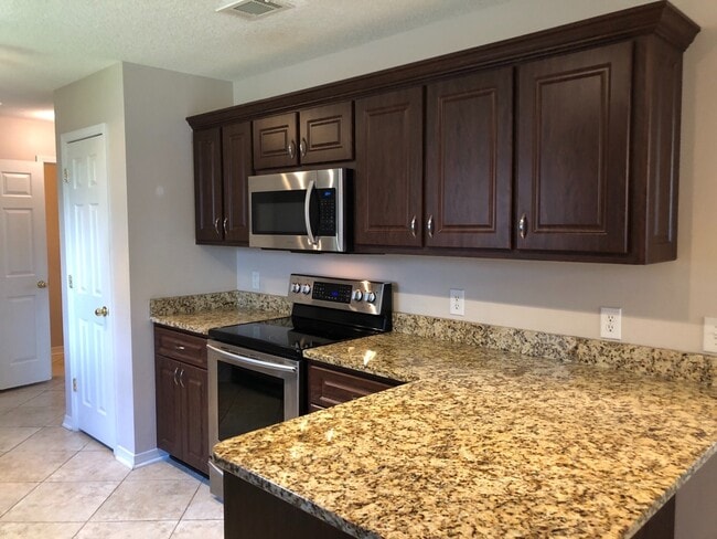 Building Photo - Gulf Breeze - Grand Ridge - 4 bedroom, 2.5...