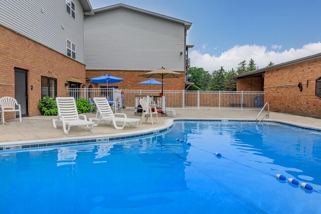 Building Photo - London Square & Blue Spruce
