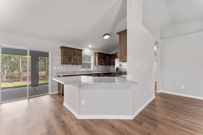 Building Photo - 9461 N Sandree Dr
