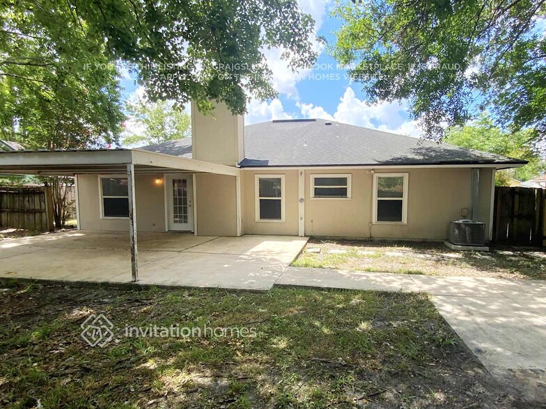 Building Photo - 9713 Peabody Dr N