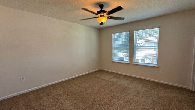 Building Photo - 2/2.5 Townhome in Prestwick – Garage & Screened Patio