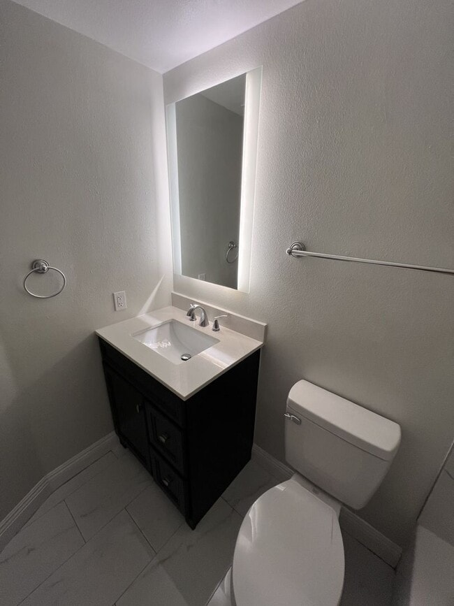 Building Photo - Spacious-Bright 3 Bedroom 2.5 Two story Bathroom Condo