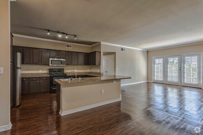 3BR,2BA - 1518SF C1 - Kitchen/Living Area - Portofino at Las Colinas