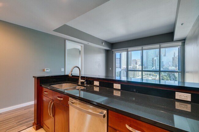 Building Photo - Iconic Strip-View Luxury | Elegant 1BR + Den High-Rise Residence