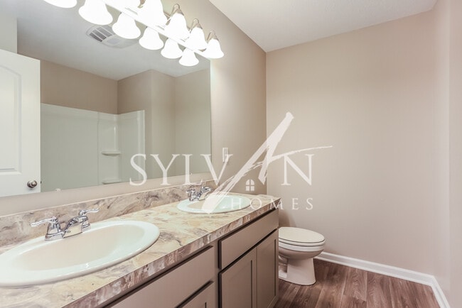 Building Photo - Turn the key. Enter. Smile. Repeat every day!