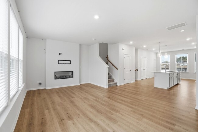 Building Photo - Brand-new three-story townhome in the University area at Senata at Research Park!