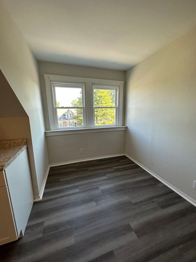 Building Photo - NORWOOD - Immaculate 1 bed efficiency unit on top floor of 4 family