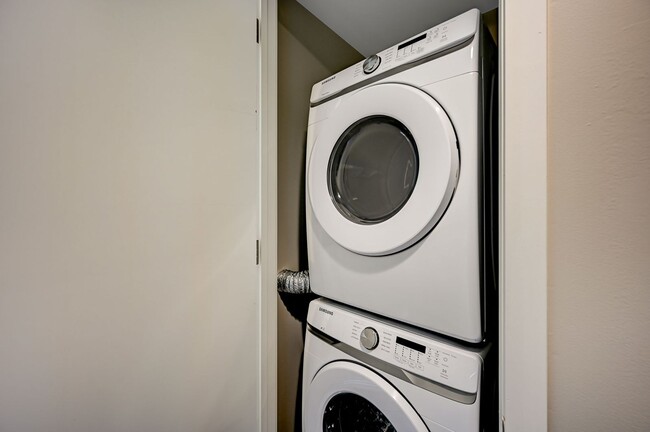 Building Photo - Fully Furnished 4th-Floor Condo with Stunning Downtown Views!