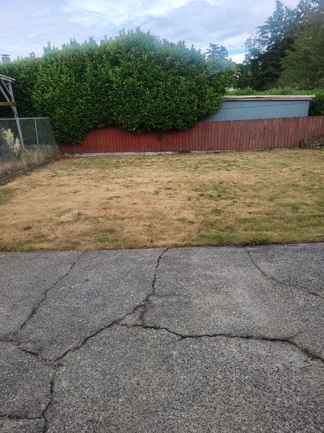 Building Photo - Cozy Parkland 2 bedroom house with Fenced Yard