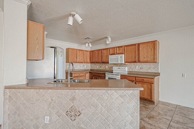 Building Photo - 3225 N 130th Ave