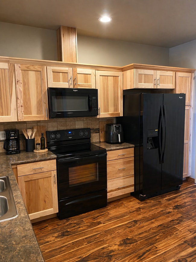 Building Photo - Beautiful Open-Concept Townhome with Washer & Dryer, Carport & $$$$ Move-In Credit