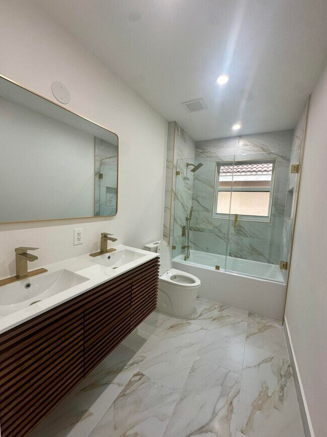 Building Photo - 10702 NW 1st Ct