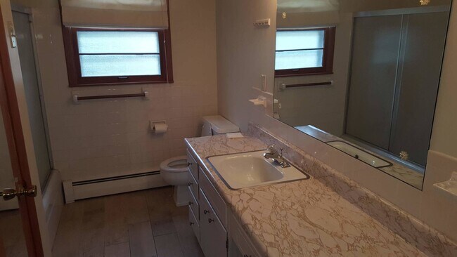 Building Photo - Updated 2 bd, 1.5 ba house, Parkade Sub., hardwoods, 5 min. from 70, fenced, avail now