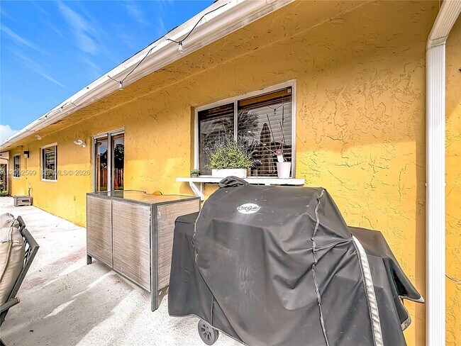 Building Photo - 8060 NW 51st Ct