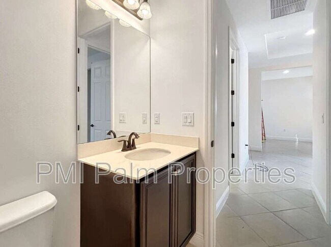 Building Photo - 9870 SW Trumpet Tree Cir