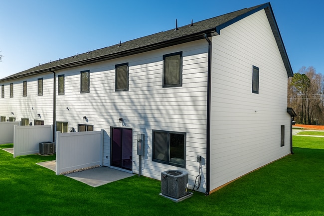 Building Photo - Brand-New Luxury Townhomes – Move-In Speci...