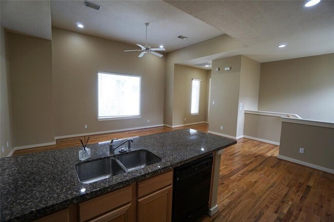 Building Photo - Elegant Gated Townhome Offering Unparallel...