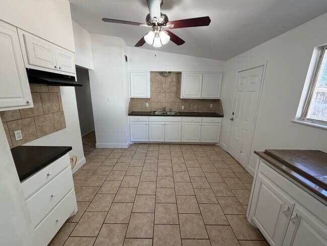 Building Photo - 6004 Peoria Ave