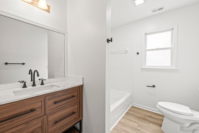 Building Photo - Renovated Home on Large Corner Lot in Coveted Strathy Hall