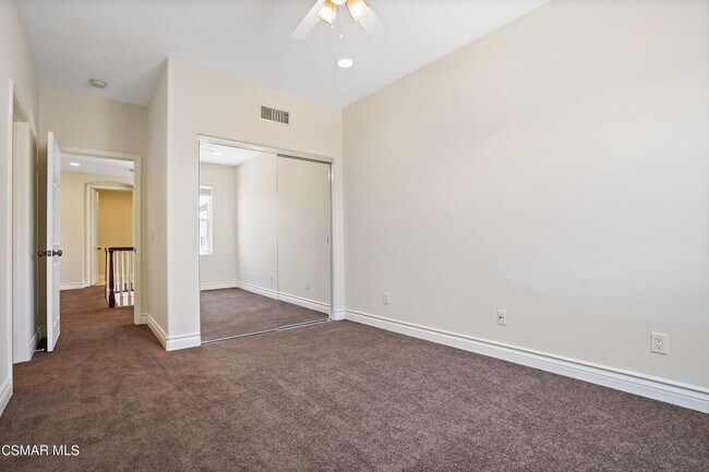 Building Photo - 6077 Mandeville Pl