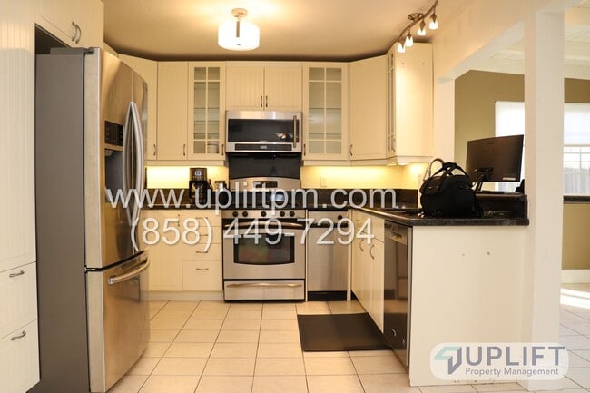 Building Photo - 4 BEDROOM/2 BATHROOM - MIRA MESA