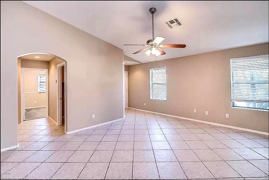 Large family room with tile floor - 10608 E Caballero St