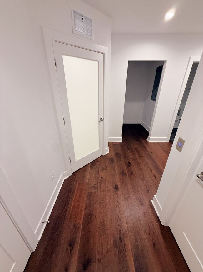 Building Photo - Brand new 4 level, 4 Bedroom Townhome with Elevator!