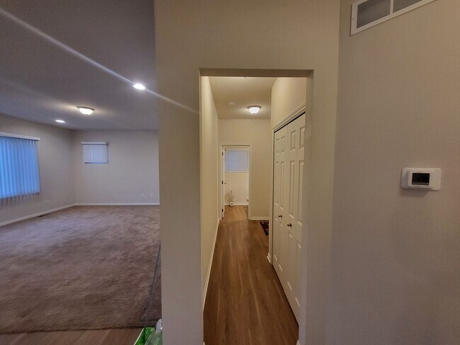 Building Photo - Spacious 4-Bedroom, 2.5-Bath Home Near Dow...
