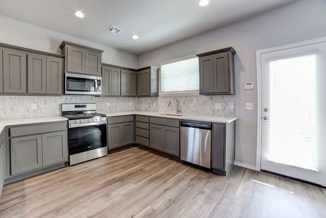 Building Photo - Luxury townhomes near TU and Mother Road M...