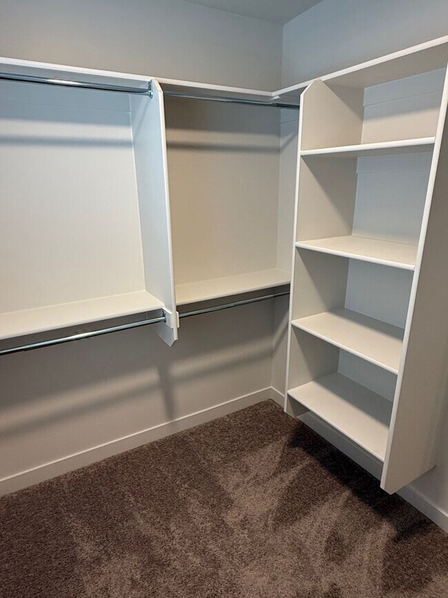 Building Photo - Half off first months rent - Beautiful townhome, construction just completed, 2 car garage, centr...